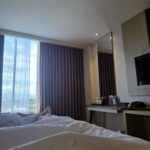 Relaxed rooms in a polished hotel offering a restaurant