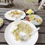 Casual rooms in a modern hotel offering an open-air restaurant & an outdoor swimming pool.