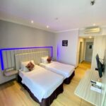 Polished quarters in an upmarket hotel featuring an outdoor pool