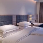 a gym & 2 outdoor pools.