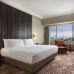 a sleek lobby bar & a rooftop pool.