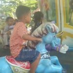 Family tourist park with fairground rides