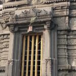 18th-century Hindu temple built for Shiva on the riverbank features a large bell.