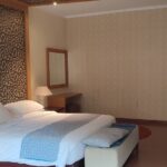 Indonesian-style rooms in an informal hotel offering a restaurant