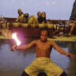 Snug rooms & suites with stone balconies in an all-inclusive hotel offering a rustic bar.