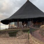 a bar & an outdoor pool