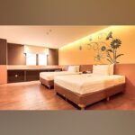 Sleek rooms in a modern hotel offering an international restaurant