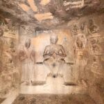 These ancient caves were once used by Buddhist monks & feature carvings & scenic views.