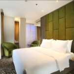 Refined hotel with multiple eateries & a rooftop pool