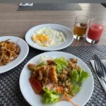 Understated rooms & suites in a contemporary hotel featuring a restaurant