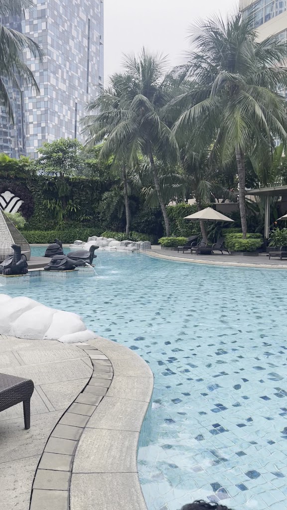 Upscale hotel offering an outdoor lagoon-style pool