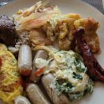 Warm rooms & suites in a chic hotel offering refined dining & a spa